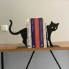 serre livre chat noir