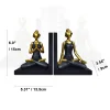 ajoutez une touche de style à votre étagère avec le serre livre bouddha dorée : deux serre-livres or et noir en forme de femmes dans des poses méditatives sur des bases noires. dimensions : 15 cm de haut x 13,5 cm de large x 9 cm de haut : 15 cm de haut x 13,5 cm de large x 9 cm de profondeur - idéal pour tout amateur de livres.