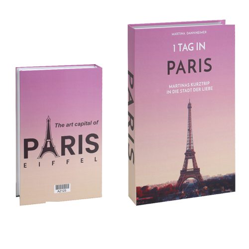 Deux livres aux couvertures rose et violette représentent la Tour Eiffel. Le livre de gauche, un Accessoire de lecture, est intitulé La capitale de l'art, PARIS. Le livre de droite, 1 TAG IN PARIS, comporte un texte en allemand et une grande photo de la Tour Eiffel en bas de page.