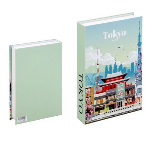 Deux boîtes de rangement en forme de livre sont présentées. L'une est fermée, révélant une couverture vert pastel et un code-barres. L'autre est ouverte et présente un paysage urbain coloré de Tokyo avec des points de repère - une trouvaille délicieuse pour tout passionné de lecture ou amoureux de la Bibliothéque.