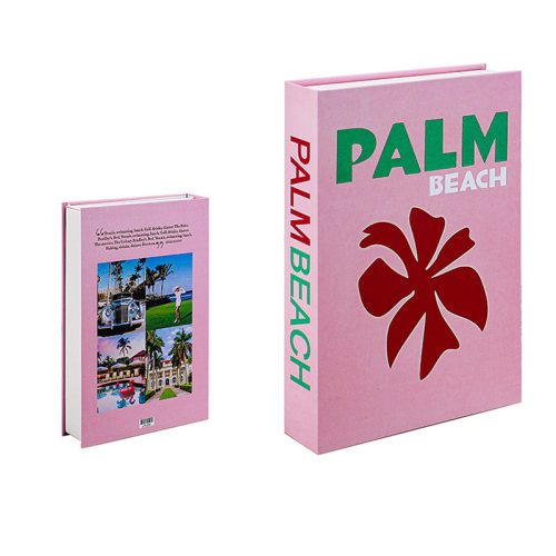 Deux livres avec des couvertures roses. Le plus grand livre présente PALM BEACH en vert et texte blanc avec un grand graphique de fleur de palmier rouge. Idéal pour les passionnés de lecture, le petit livre présente au dos de sa couverture quatre photos de Palm Beach et une brève description.