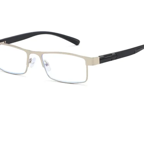 Lunettes rectangulaires avec monture en métal argenté mat, verres transparents, plaquettes de nez réglables et branches en plastique noir. Le design moderne et minimaliste est parfait pour un usage quotidien - idéal pour ceux qui apprécient une touche littéraire.