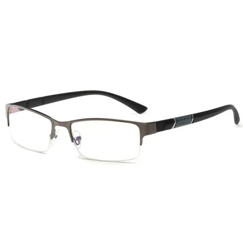 Une paire de lunettes rectangulaires avec une fine monture marron métallisée et des verres transparents repose élégamment sur un fond blanc - un accessoire parfait pour plonger dans votre prochain roman ou pour orner votre étagère d'un charme littéraire.